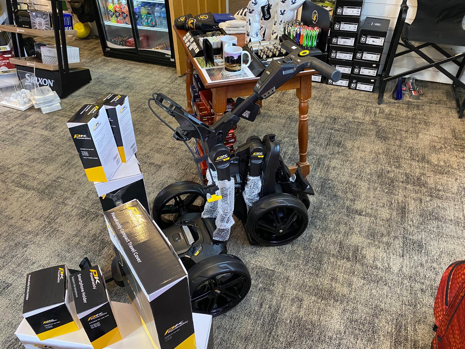 Powakaddy electric trolley and accessories in the pro shop