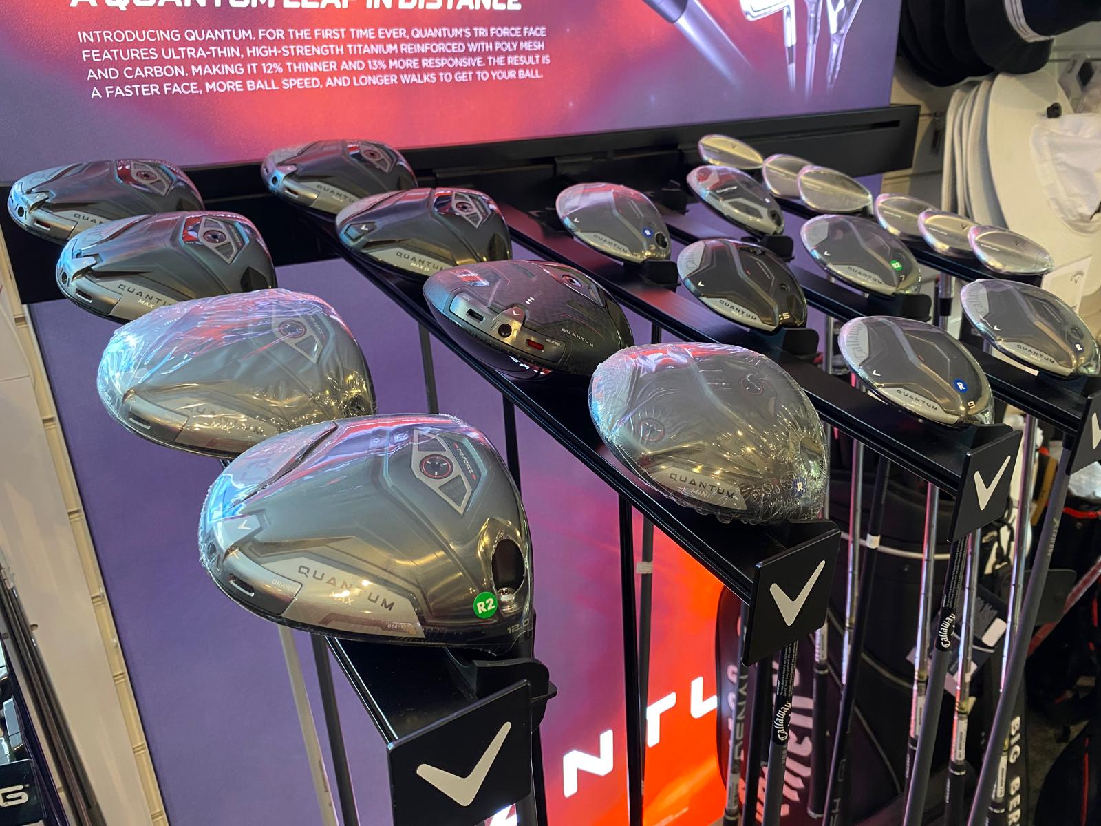 Callaway Quantum driver range on a pro shop stand